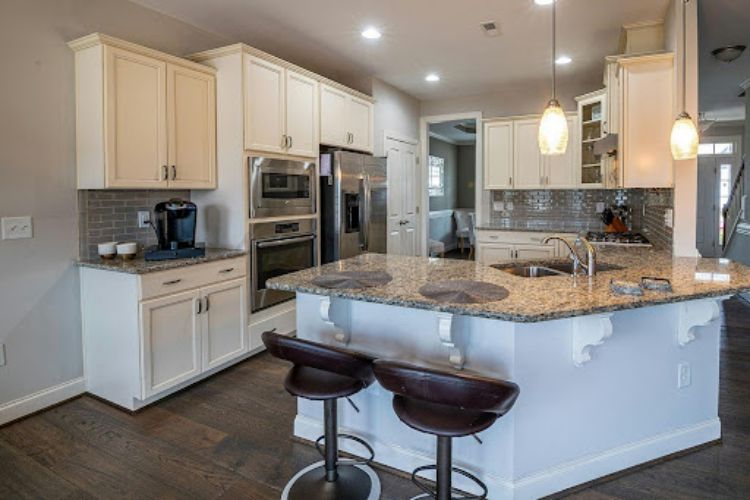pendant lights over marble kitchen counter